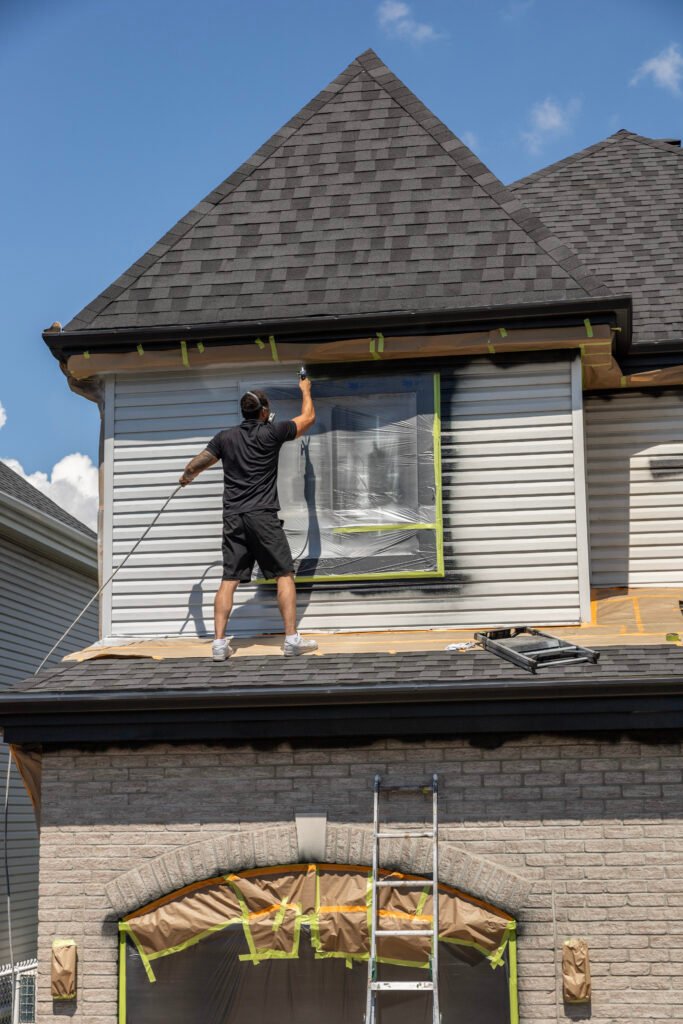 Elite Spray Service - Peintre de maison extérieur photo 8